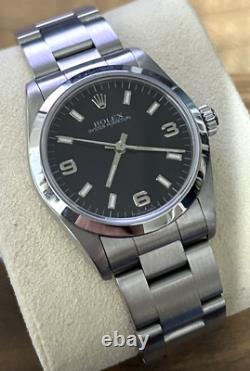 Rolex 31mm Oyster Perpetual- Black Dial & Stainless Steel 1997 Model 67480