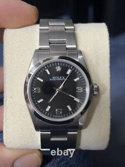 Rolex 31mm Oyster Perpetual- Black Dial & Stainless Steel 1997 Model 67480
