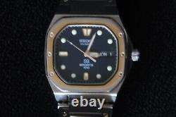 Seiko Sq 100 Sports Quartz Watch Royal Oak 8229-5010 Black & Gold Dial S/s 1980s
