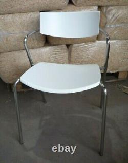 4 Chaises longues de salle à manger rétro en blanc avec pieds en acier inoxydable et siège vintage