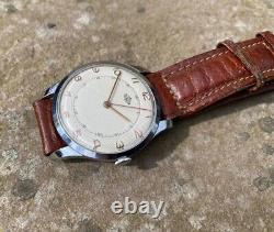 Montre ancienne Timor/Derrick pour homme datée de 1967. État impeccable