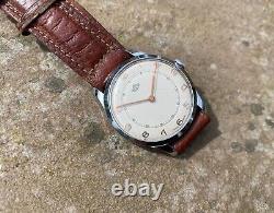 Montre ancienne Timor/Derrick pour homme datée de 1967. État impeccable