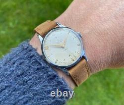 Montre vintage Smiths Deluxe A258 pour homme datée de 1954