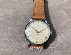 Montre vintage Smiths Deluxe A258 pour homme datée de 1954