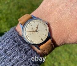 Montre vintage Smiths Deluxe A258 pour homme datée de 1954