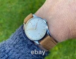 Montre vintage Smiths Deluxe A258 pour homme datée de 1954