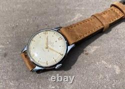 Montre vintage Smiths Deluxe A258 pour homme datée de 1954
