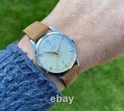 Montre vintage Smiths Deluxe A258 pour homme datée de 1954