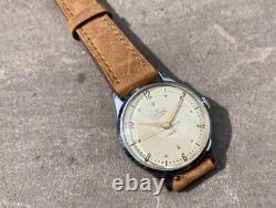 Montre vintage Smiths Deluxe A258 pour homme datée de 1954