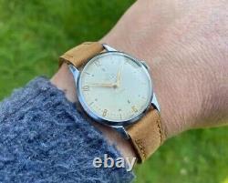 Montre vintage Smiths Deluxe A258 pour homme datée de 1954