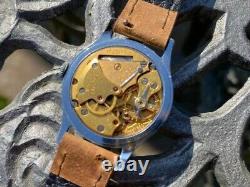 Montre vintage Smiths Deluxe A258 pour homme datée de 1954