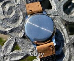 Montre vintage Smiths Deluxe A258 pour homme datée de 1954