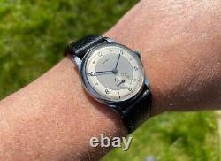 Montre vintage pour homme Lanco cadran bicolore type militaire des années 1950