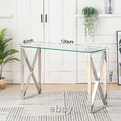 Table basse en verre avec côté en acier inoxydable chromé pour le salon.