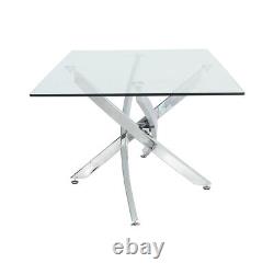 Table basse moderne avec dessus en verre trempé transparent et pied en acier inoxydable chromé